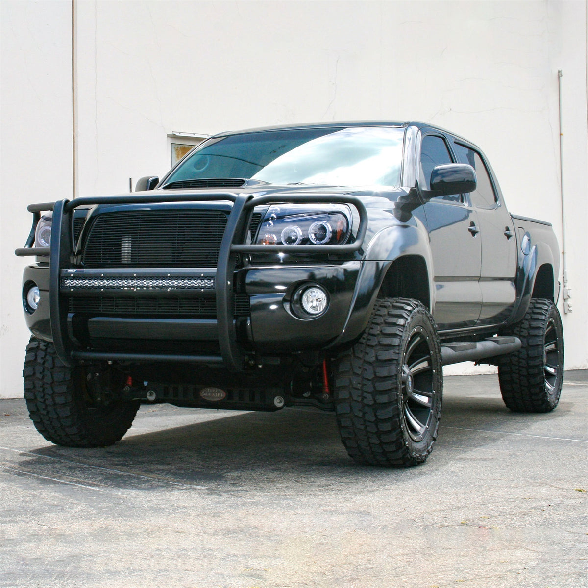 ARIES Pro Series Black Steel Grille Guard with Light Bar for Toyota Tacoma (2005-2015) - 2170001