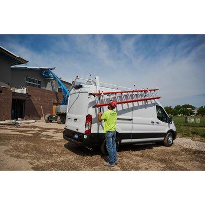 Worker lowering ladder using the EZGLIDE2™ Drop-Down system
