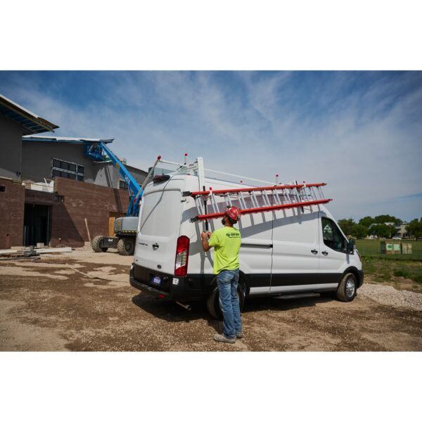 Worker lowering ladder using the EZGLIDE2™ Drop-Down system